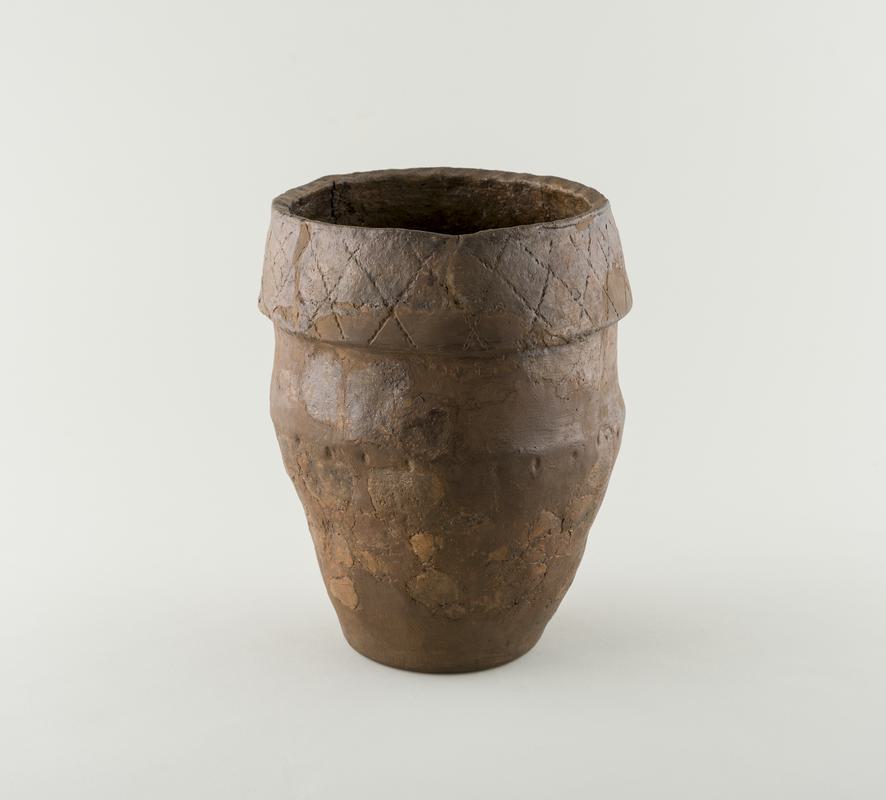 Early Bronze Age pottery collared rim urn (cinerary urn)