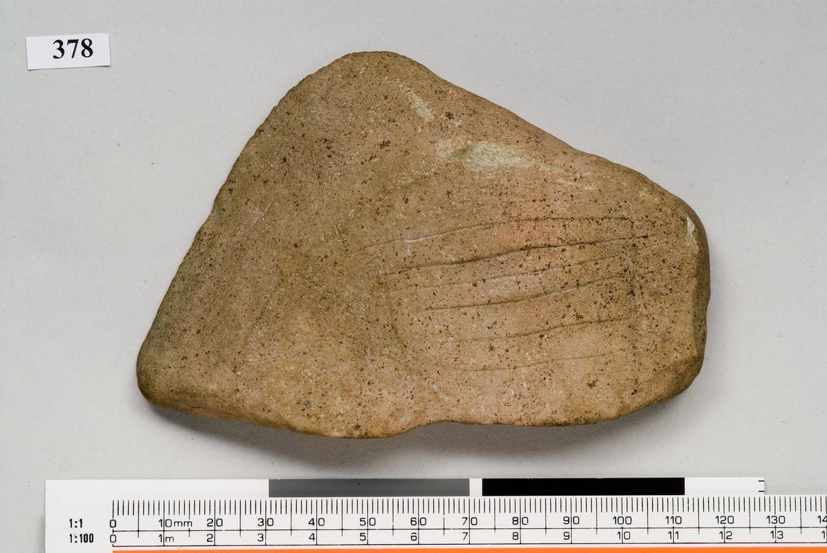 Mesolithic stone decorated pebble