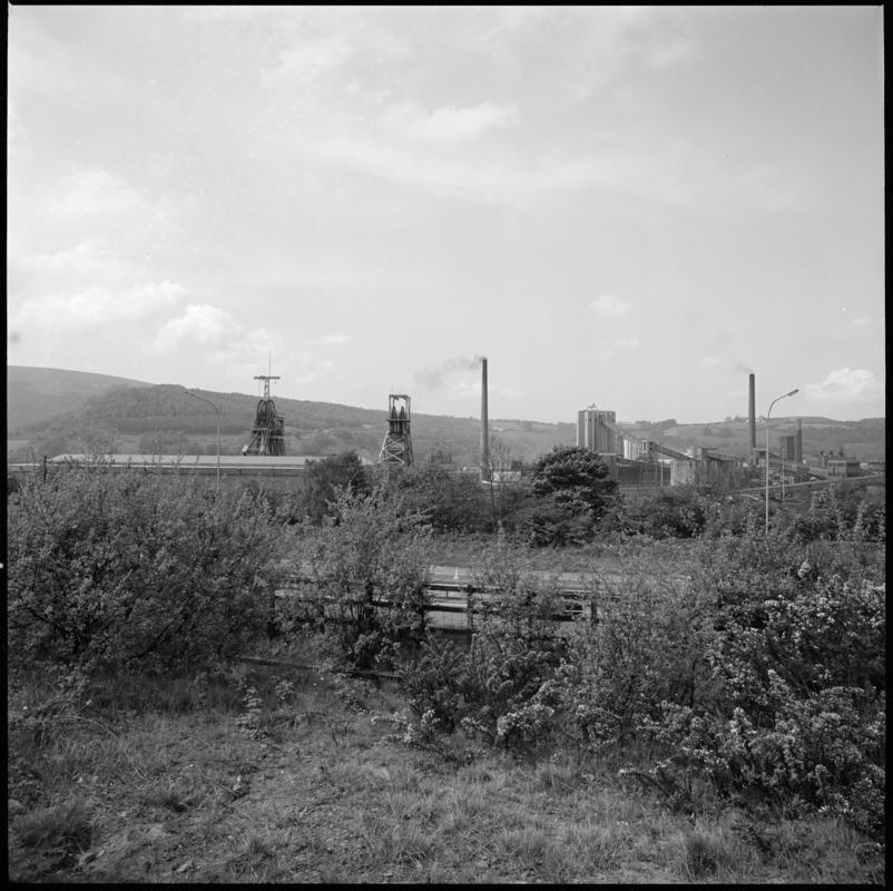 Black and white film negative showing a view towards Nantgarw Colliery.  &#039;Nantgarw&#039; is transcribed from original negative bag.