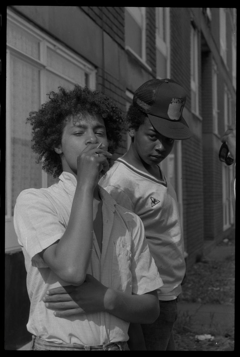 Youth smoking a cigarette in Loudoun Square area of Butetown.