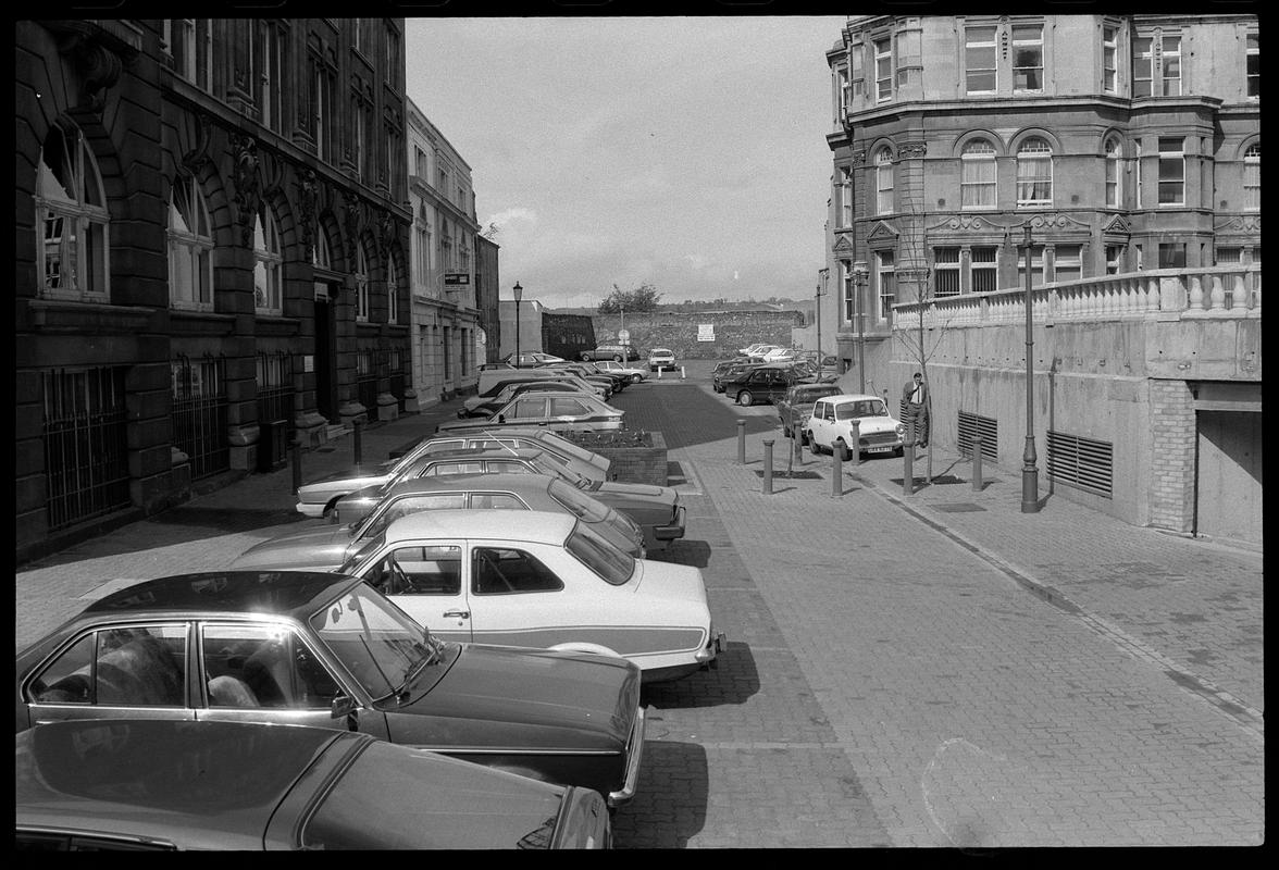 Cars parked in front of Exchange Building.