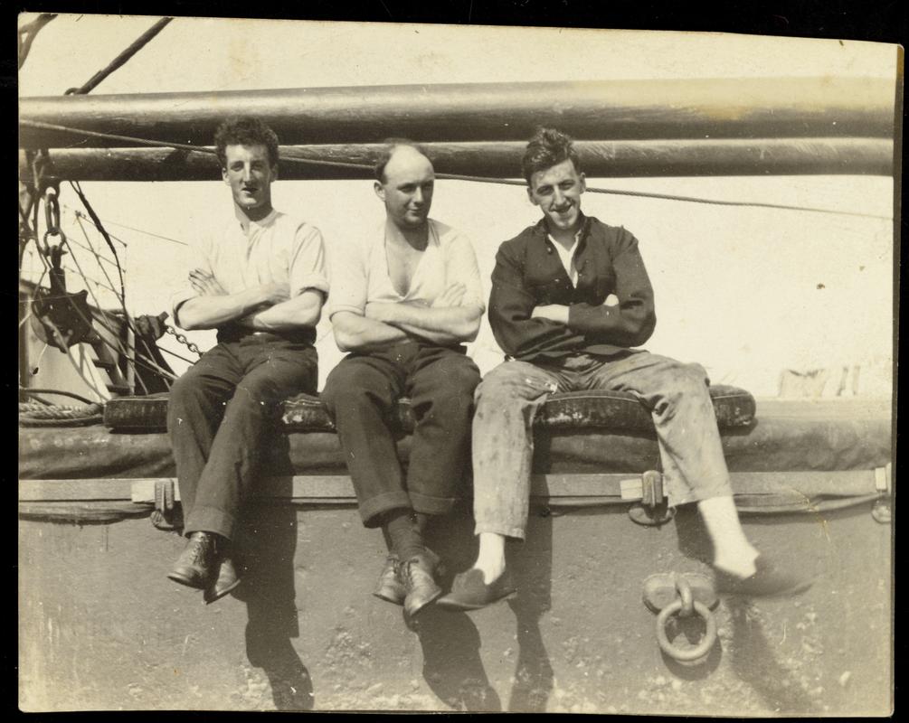 David Jenkins, ship&#039;s carpenter (centre), with two friends on unknown vessel.