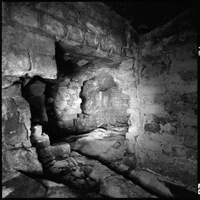 Black and white film negative showing the remains of a ventilation furnace at the No.3 landing, Hetty shaft, Tymawr Colliery March 1980.  &#039;Hetty shaft No.3 landing, March 1980&#039; is transcribed from original negative bag.