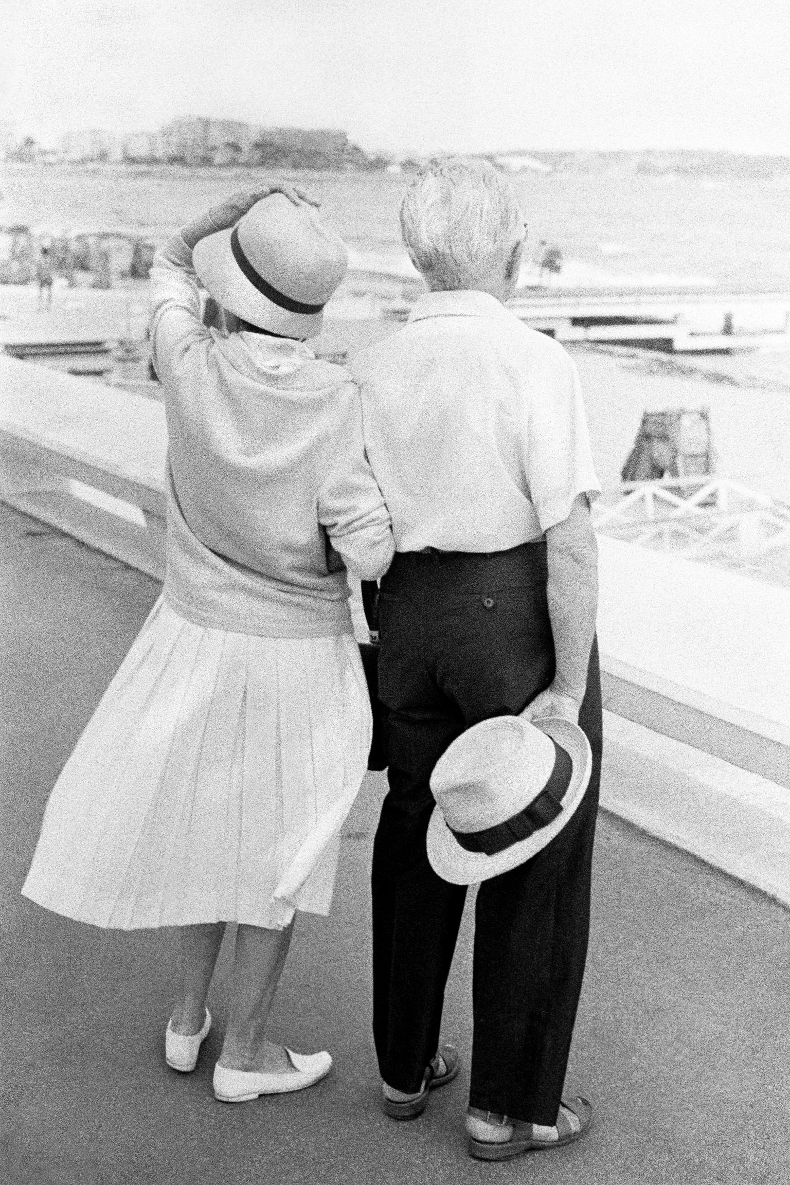 Loving couple on windy day on the promenade at Cannes. France