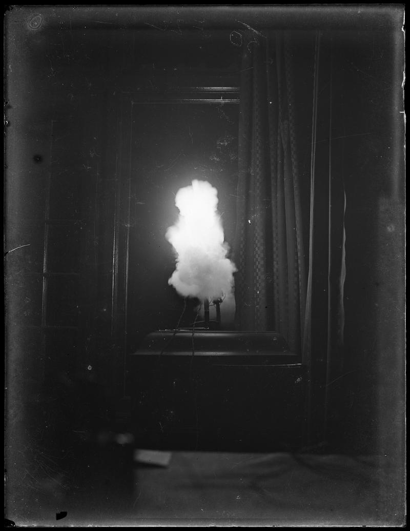 Adjusting flash, glass negative