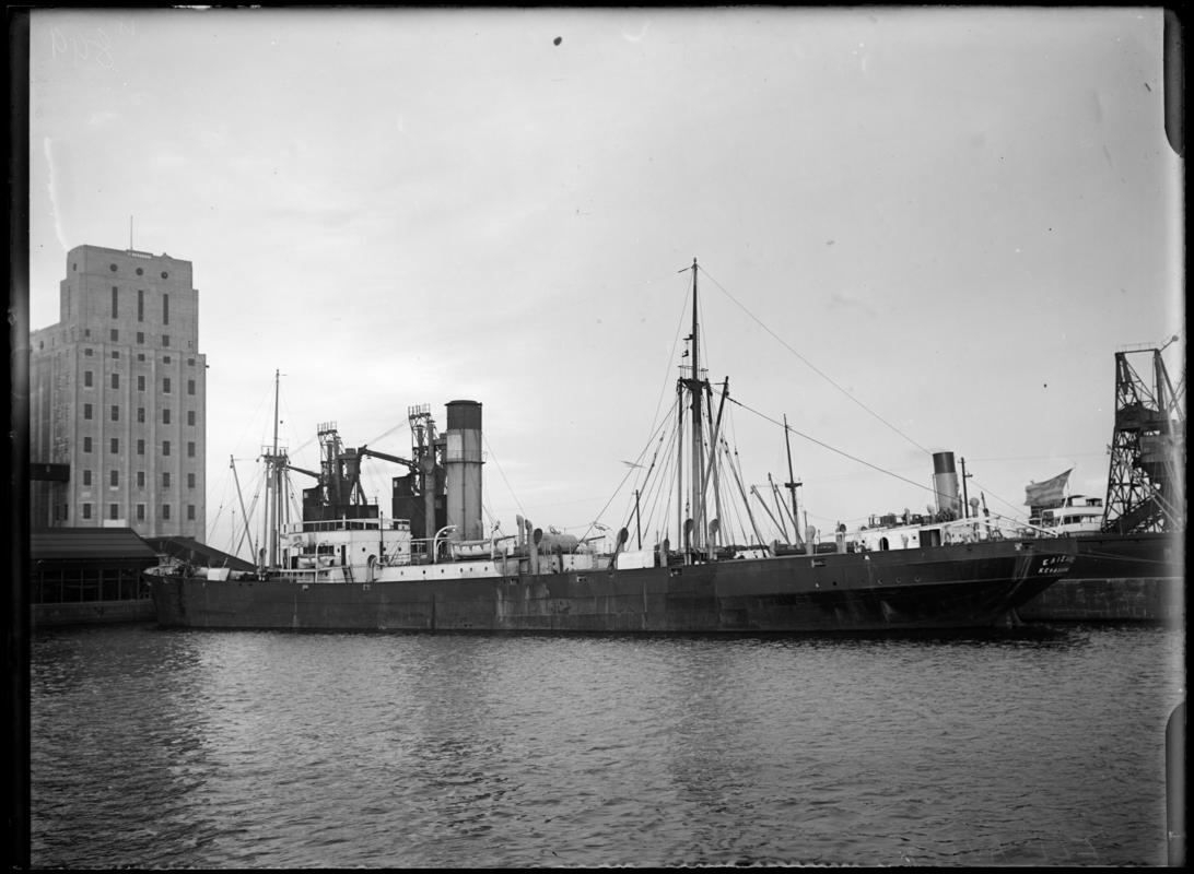 Three quarter Port stern view of Greek vessel S.S. ELIZABET discharging her cargo at the suction grain elevators in Roath Dock, Cardiff, c.1936.
