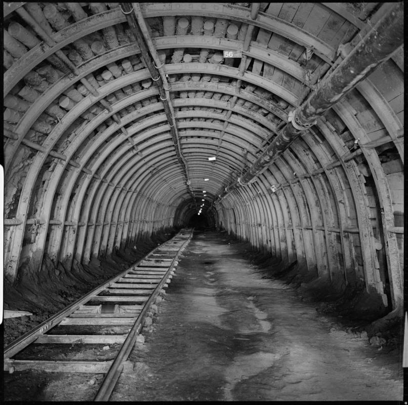 Black and white film negative showing an underground roadway, Blaenserchan Colliery 1978-9.  &#039;Blaenserchan 1978-9&#039; is transcribed from original negative bag.