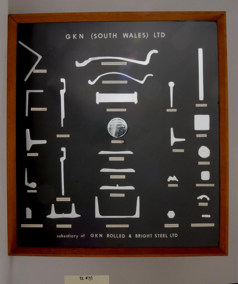 rolled steel sections, mounted in display case