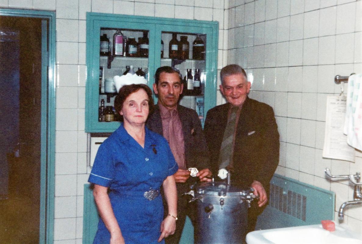 Mrs Barker with Denzil Williams (Bargoed Colliery Safety Officer) and Calvin Quick (first aider in medical centre) at Bargoed Colliery Medical Centre