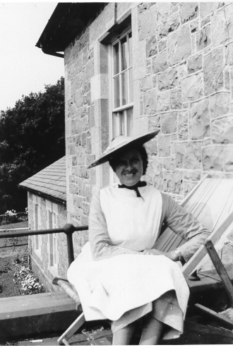 Dinorwig Quarry Hospital. Nancy (Griffith and Marie Therese Hughes&#039; maid) sitting on the balcony at DQH.