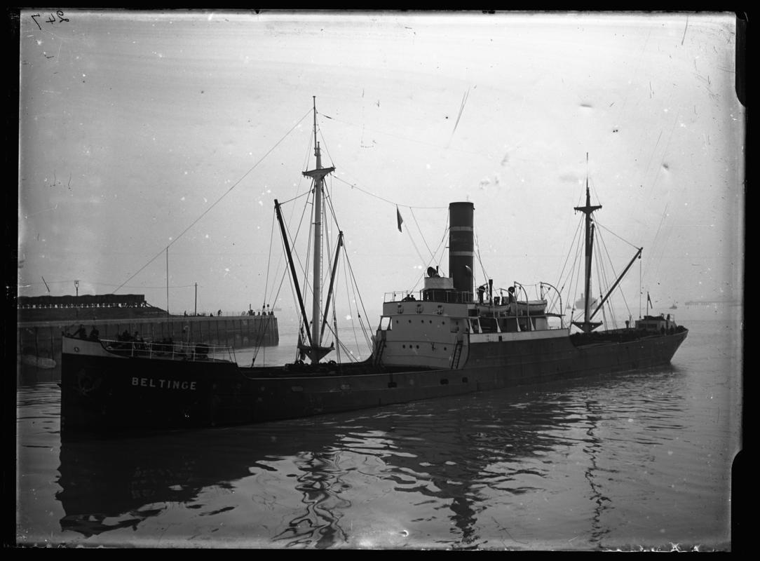 Starboard broadside view of S.S. BELTINGE entering Cardiff Docks, c.1936.