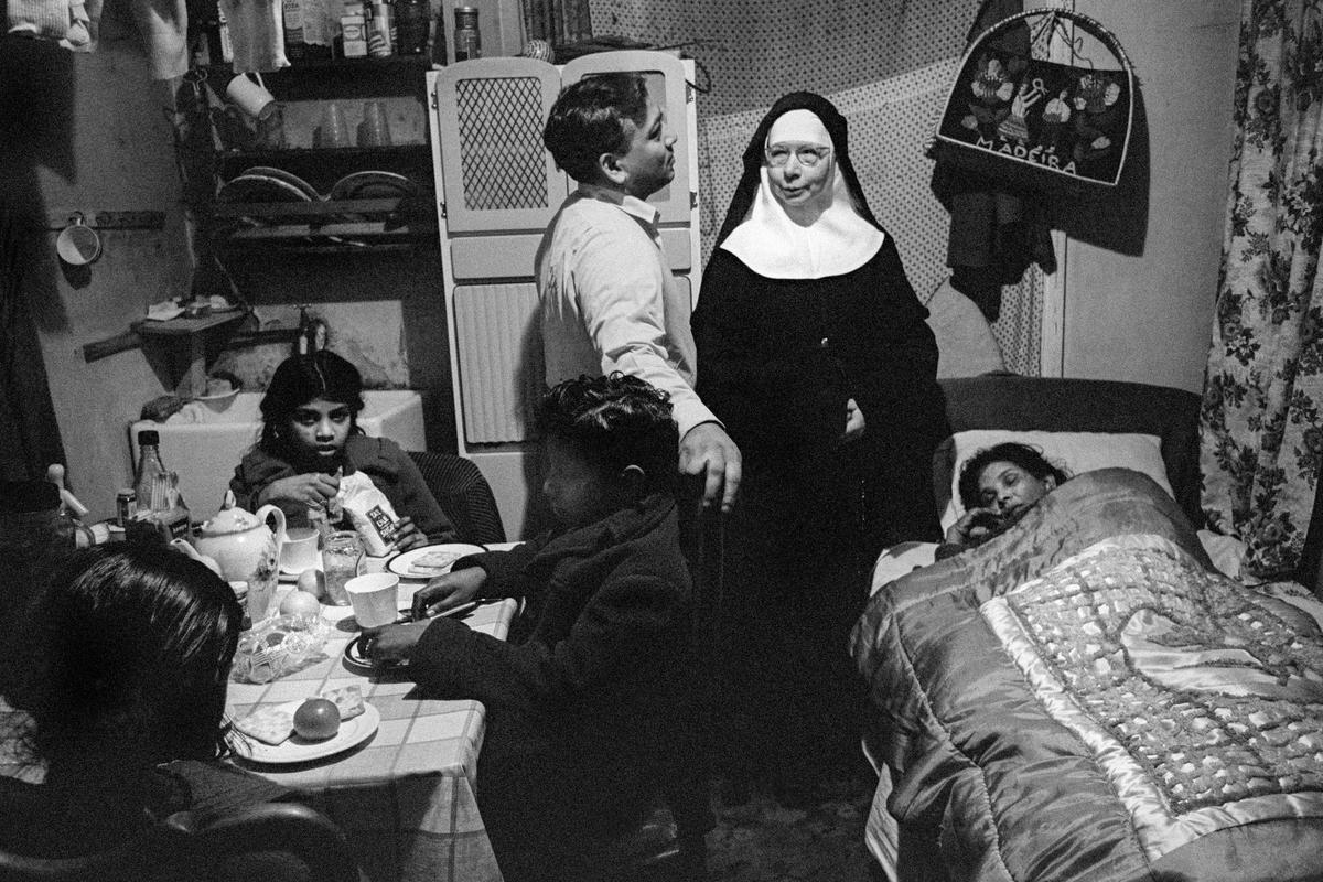 GB. ENGLAND. London, Nottinghill Gate. The Sisters of Mercy are an international community of Roman Catholic women religious vowed to serve people who suffer from poverty, sickness and lack of education. They participate in the life of the surrounding community. In keeping with their mission many sisters engage in teaching, medical care, and community programs. 1963.