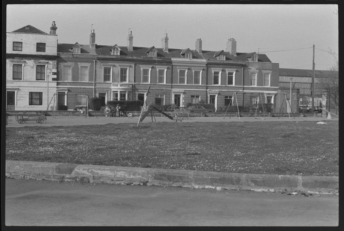 Houses in Bute Esplanade with playground in foreground.