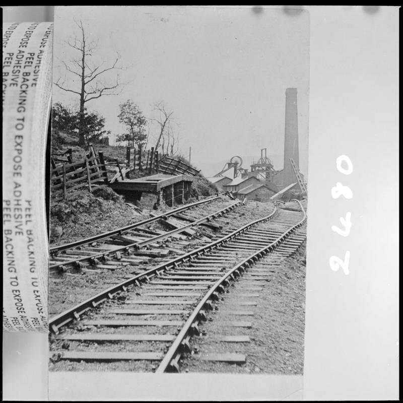 Black and white film negative of a photograph showing a landslip in ?Tredegar.  &#039;Tredegar landslip&#039; is transcribed from original negative bag.