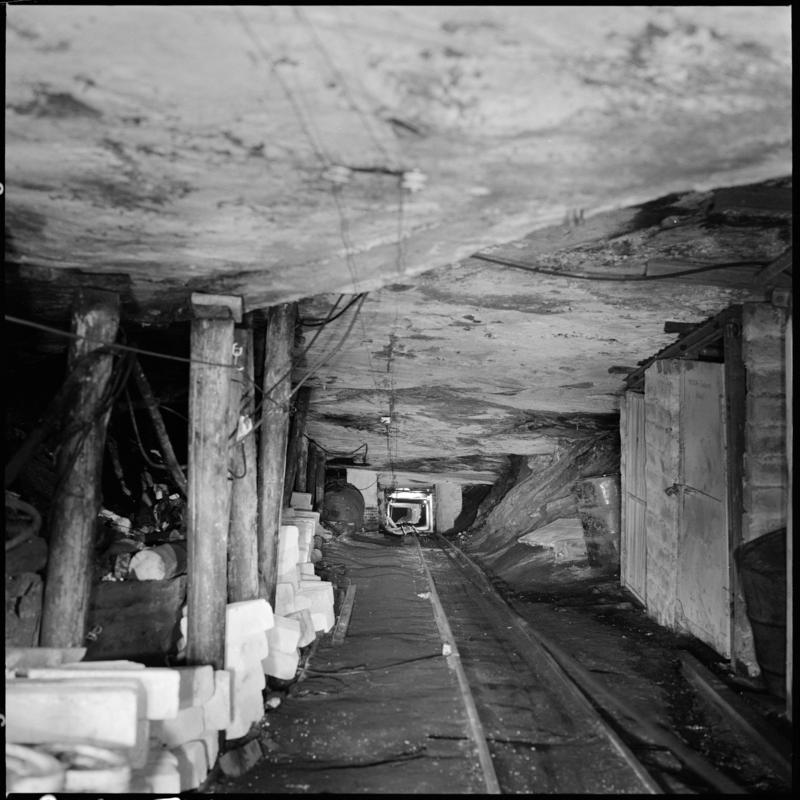 Black and white film negative showing an underground roadway, Morlais Colliery.  &#039;Morlais&#039; is transcribed from original negative bag.