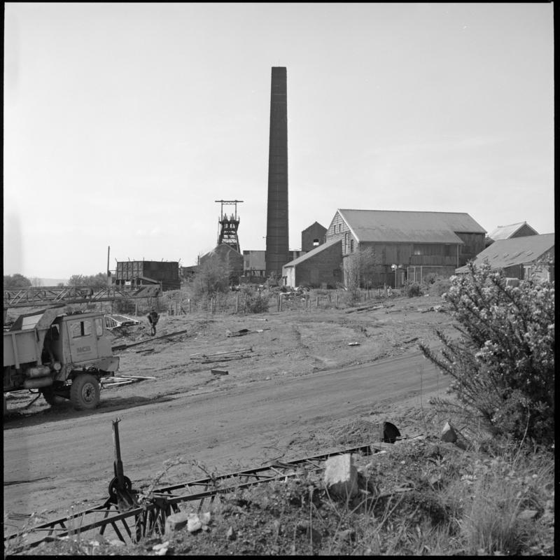 Black and white film negative showing a general surface view of Morlais Colliery 13 May 1981.  &#039;Morlais 13/5/81&#039; is transcribed from original negative bag.