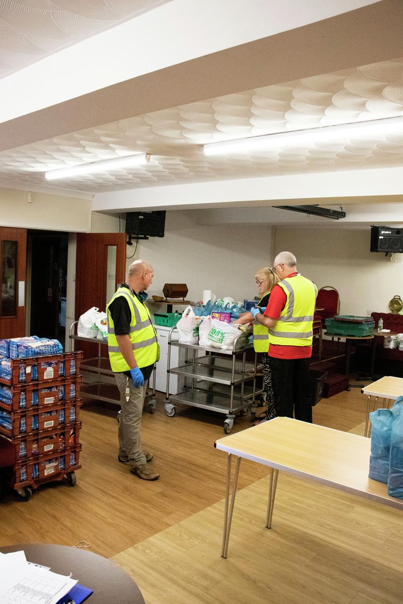 Staff and volunteers from Made in Tredegar preparing and delivering food during Covid-19 pandemic.