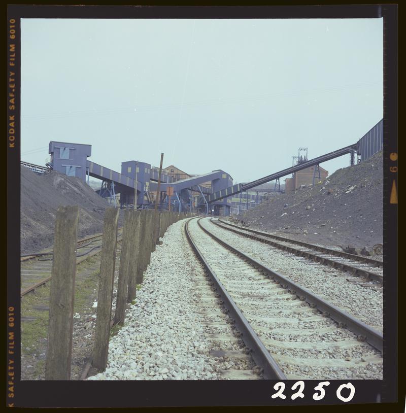 Colour film negative showing a surface view of Oakdale Colliery taken from the rail track, 16 April 1981.  &#039;Oakdale 16 Apr 1981&#039; is transcribed from original negative bag.  Appears to be identical to 2009.3/1737.