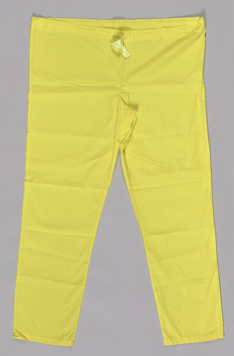 Yellow trousers, part of a two piece scrubs set.