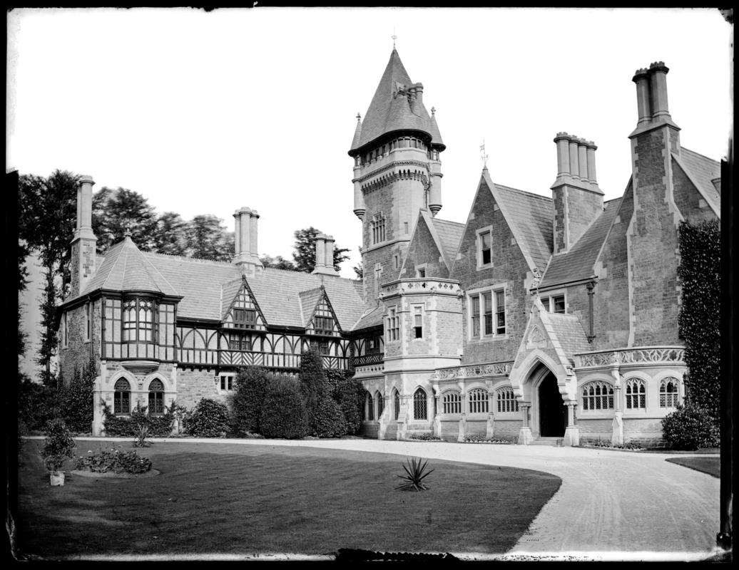 Main front of Ely Court (now Insole Court) showing tower (1874) and north wing, porch and perambulatory (by 1878), c.1880.