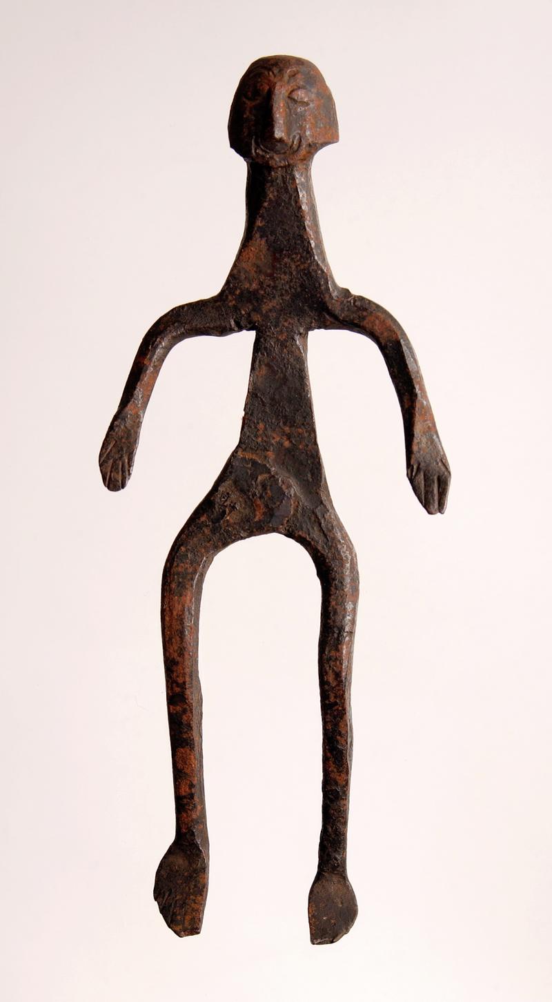 Spirit doll, made completely of iron, from the Congo; made to house the soul on a man&#039;s death; resembles a human body with head and face.