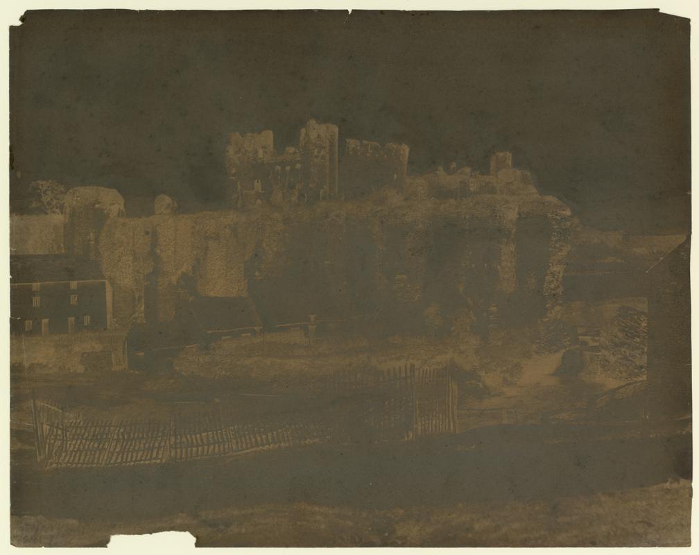 Wax paper calotype negative. Caerphilly Castle from the village (1855-1860)