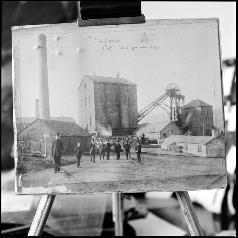 Film negative of a photograph showing a general surface view of Deep Navigation Colliery, 1878.  The engine house housed the vertical winder.  The figure on the left is the colliery policeman  &#039;Deep Navigation&#039; is transcribed from original negative bag.  Appears to be identical to 2009.3/1215.