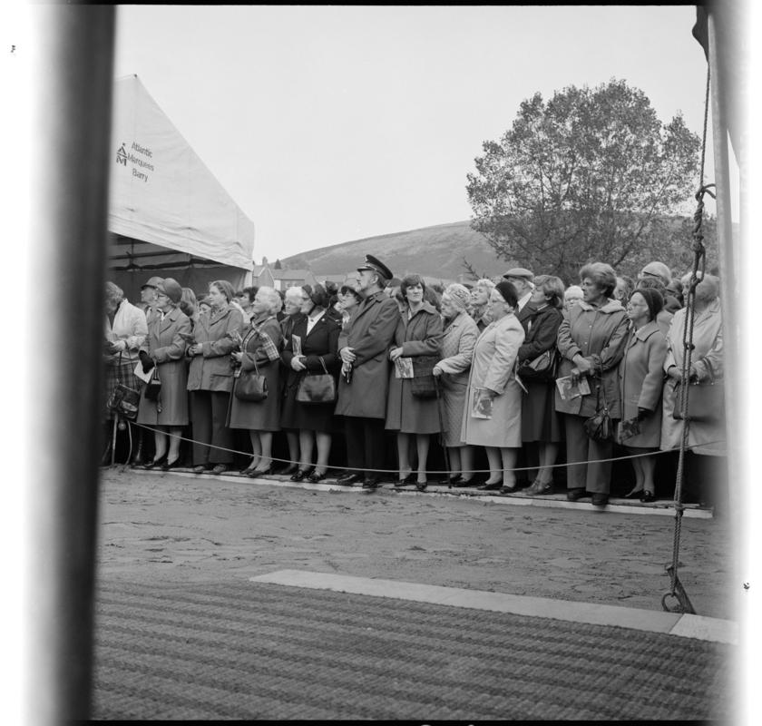 Black and white film negative showing the unveiling ceremony of the Senghenydd memorial, commemorating the 1913 Universal Colliery explosion.  The negative is undated but the unveiling ceremony took place in October 1981.  &#039;Senghenydd&#039; is transcribed from original negative bag.