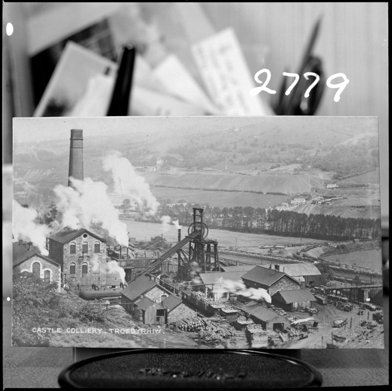 Black and white film negative of a photograph showing a surface view of Castle Colliery, Troedyrhiw, Merthryr Tydfil. &#039;Castle Pit Merthyr Tydfil&#039; is transcribed from original negative bag.