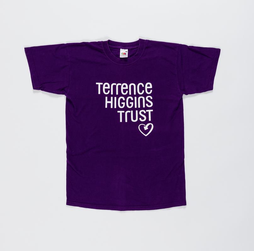 Dark purple t-shirt with &#039;Terrence Higgins Trust&#039; logo on the front.