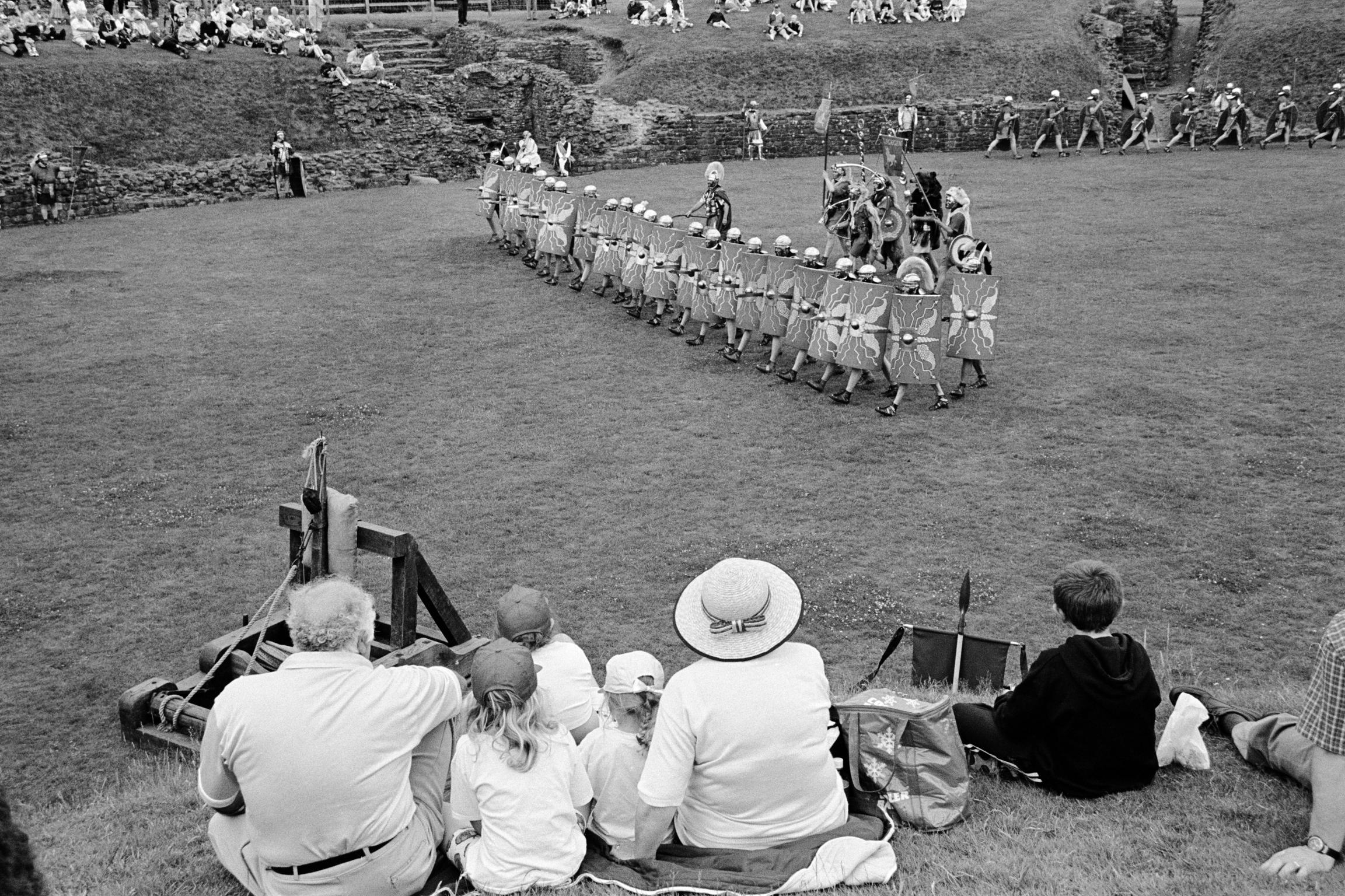 The Roman re-enactment society in the original amphitheatre of the Roman fort. Caerleon, Wales