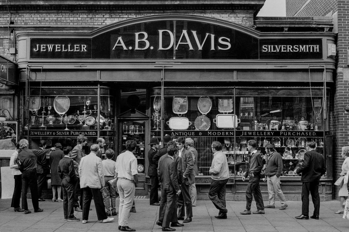 GB. ENGLAND. London. Queensway. Smash and grab raid on A B David jewellers and Silversmiths. Photographed when I was on my way to my ritual morning coffee. Published as a wrap around cover of the Sunday Mirror. 1969. (Image 8/8)