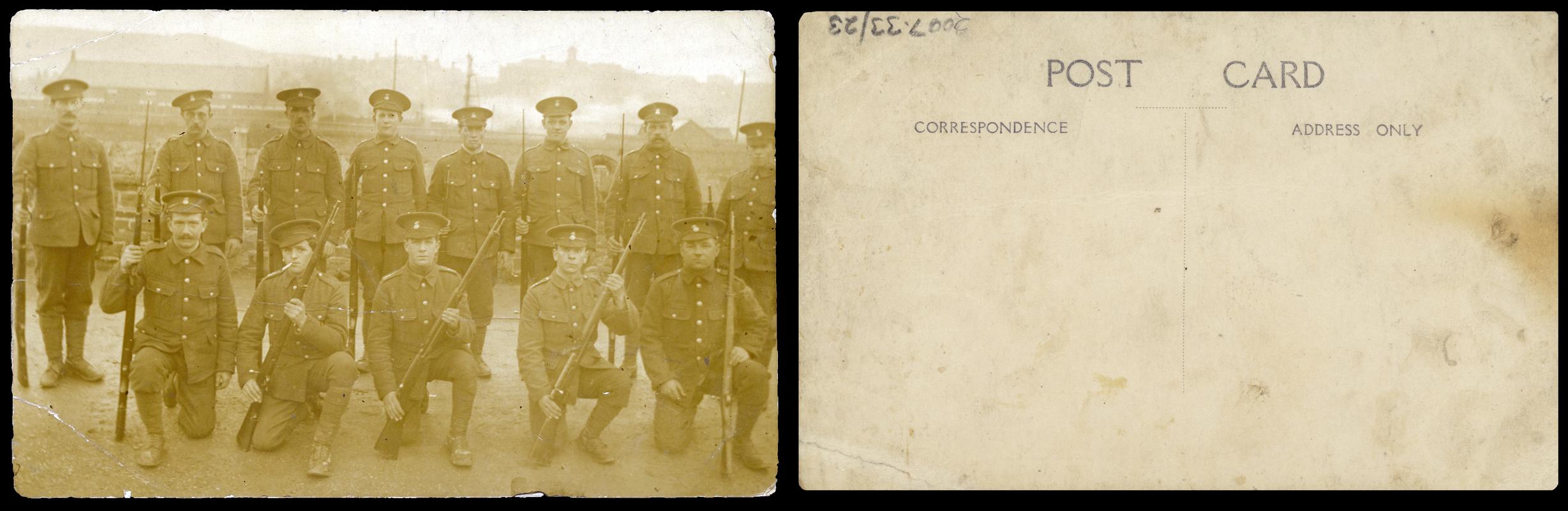 Group of 13 soldiers holding rifles (front &amp; Back)