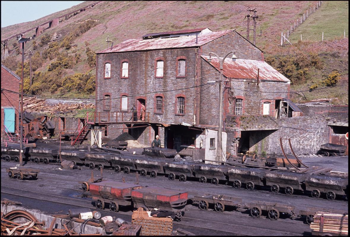 Colour film slide showing Graig Merthyr Colliery yard in 1977 and a long journey of drams.