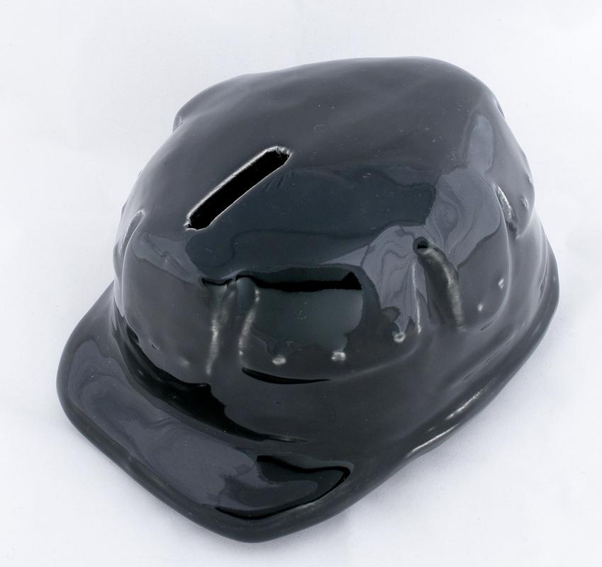 Pottery money box in shape of miners safety helmet
