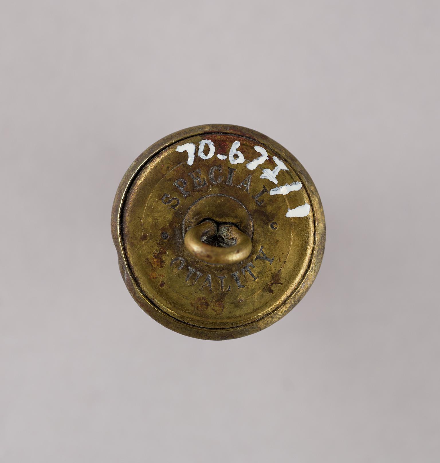 T.V.R. uniform button