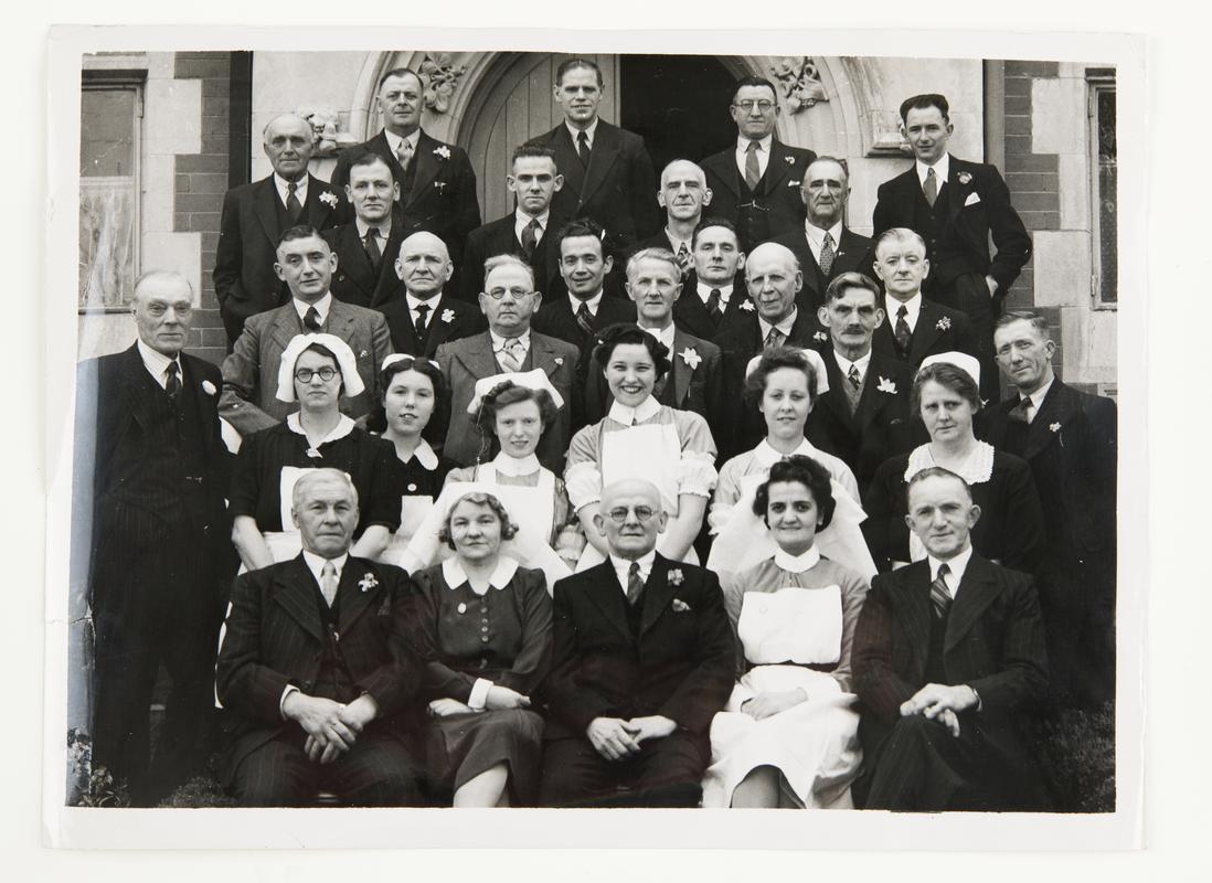 Group photograph of the Oakdale hospital committe staff. Albert Morgan is in the 4th row down, 4th from left.
