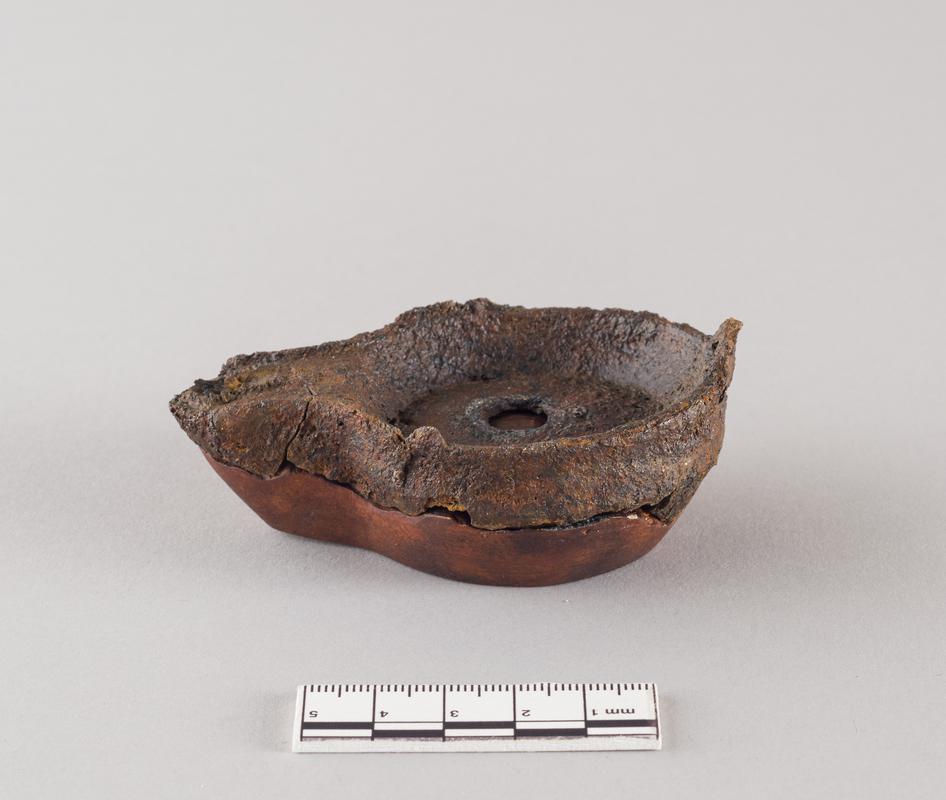 Roman iron oil lamp