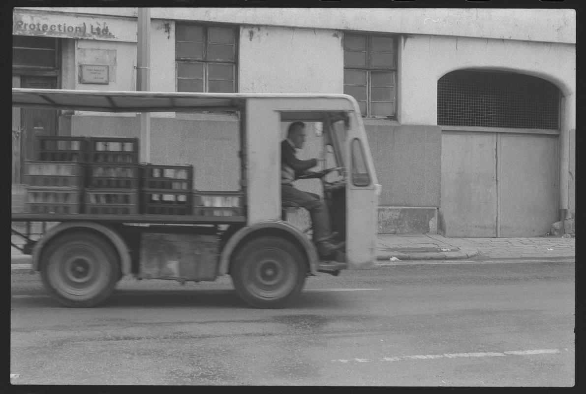 Milk float in Bute Street, outside Maritime Hall in Butetown.