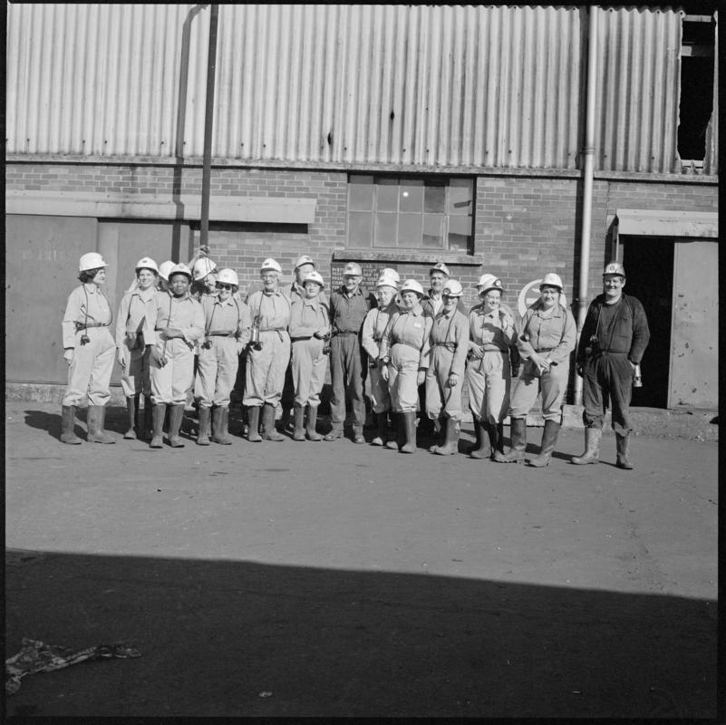 Black and white film negative showing a group of nursing staff visiting Lady Windsor Colliery.