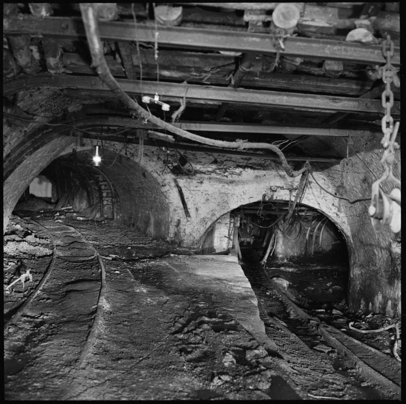 Black and white film negative showing an abandoned pit bottom, Big Pit 1975.