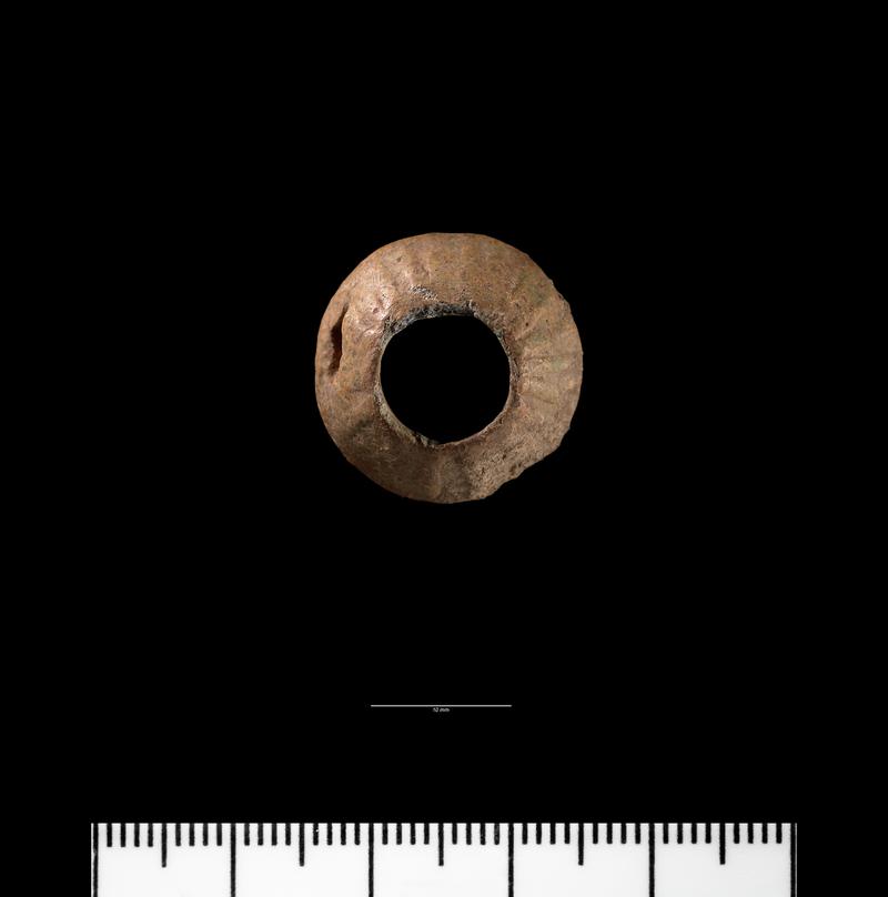 Early Medieval lead spindle whorl