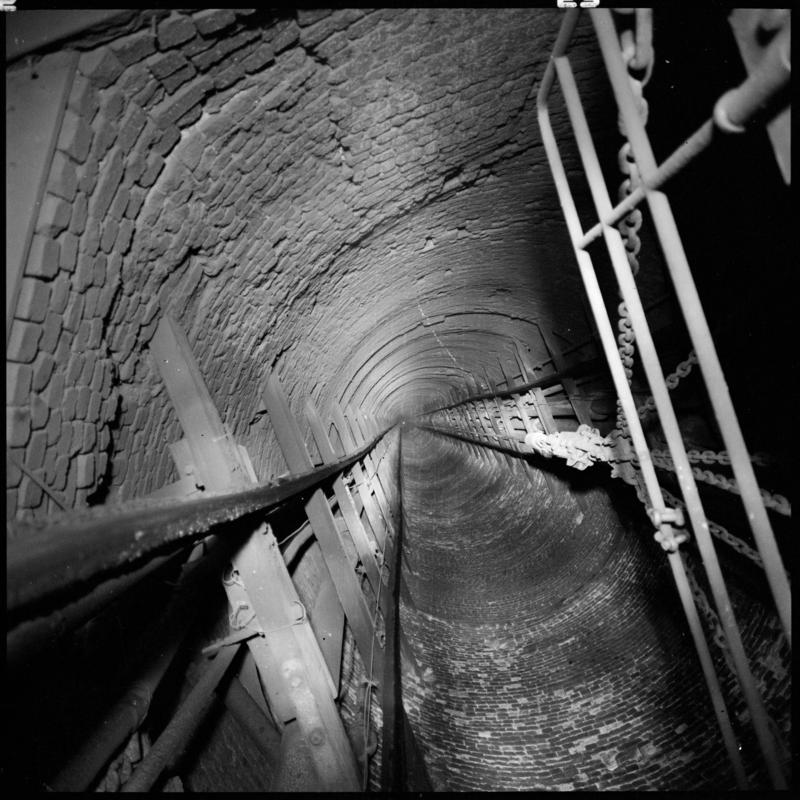 Black and white film negative showing a view looking up the Hetty shaft, Tymawr Colliery, March 1980.  &#039;Hetty shaft Ty Mawr Colliery, March 1980&#039; is transcribed from original negative bag.