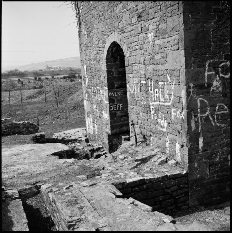 Black and white film negative showing the remains of the engine house with graffiti, Scott&#039;s Pit, Llansamlet. &#039;Scotts Pit&#039; is transcribed from original negative bag.