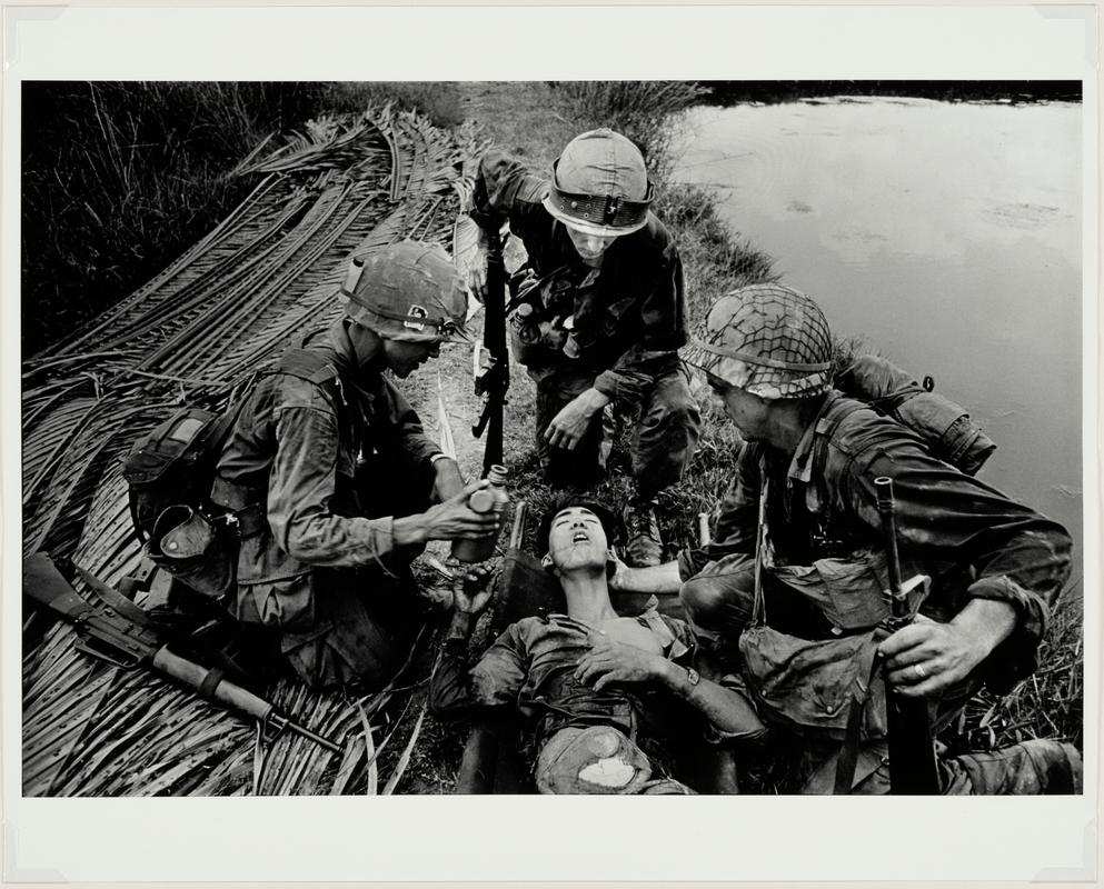 G.I&#039;s with Wounded Vietcong, 1968