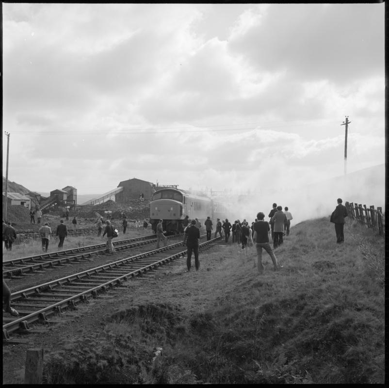 Black and white film negative showing a train passing the washery, Big Pit Colliery 1977.  &#039;Blaenavon 1977&#039; is transcribed from original negative bag.