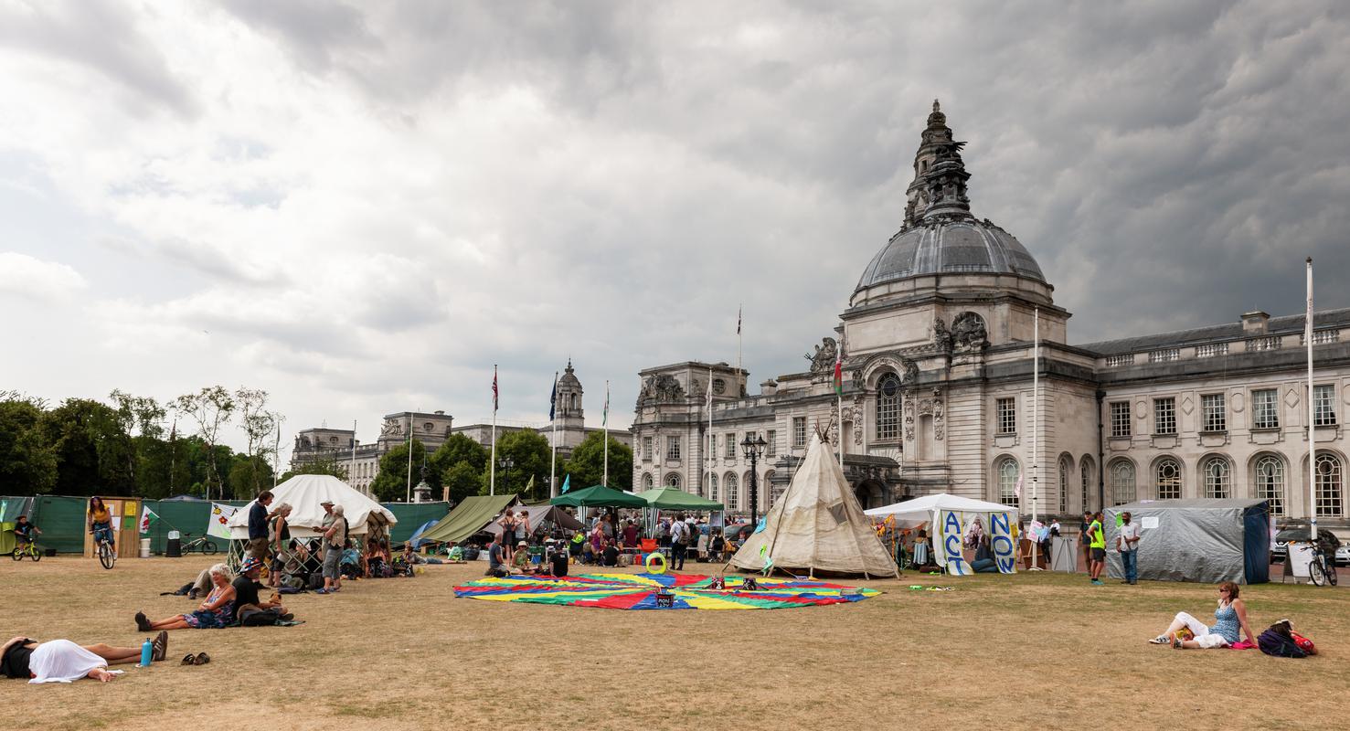 Extinction Rebellion Protest in Cardiff - Civic Centre, Museum and City Hall Lawn. Green Yachts with Protest Slogans, Protest camp and Extinction Rebellion information centre.