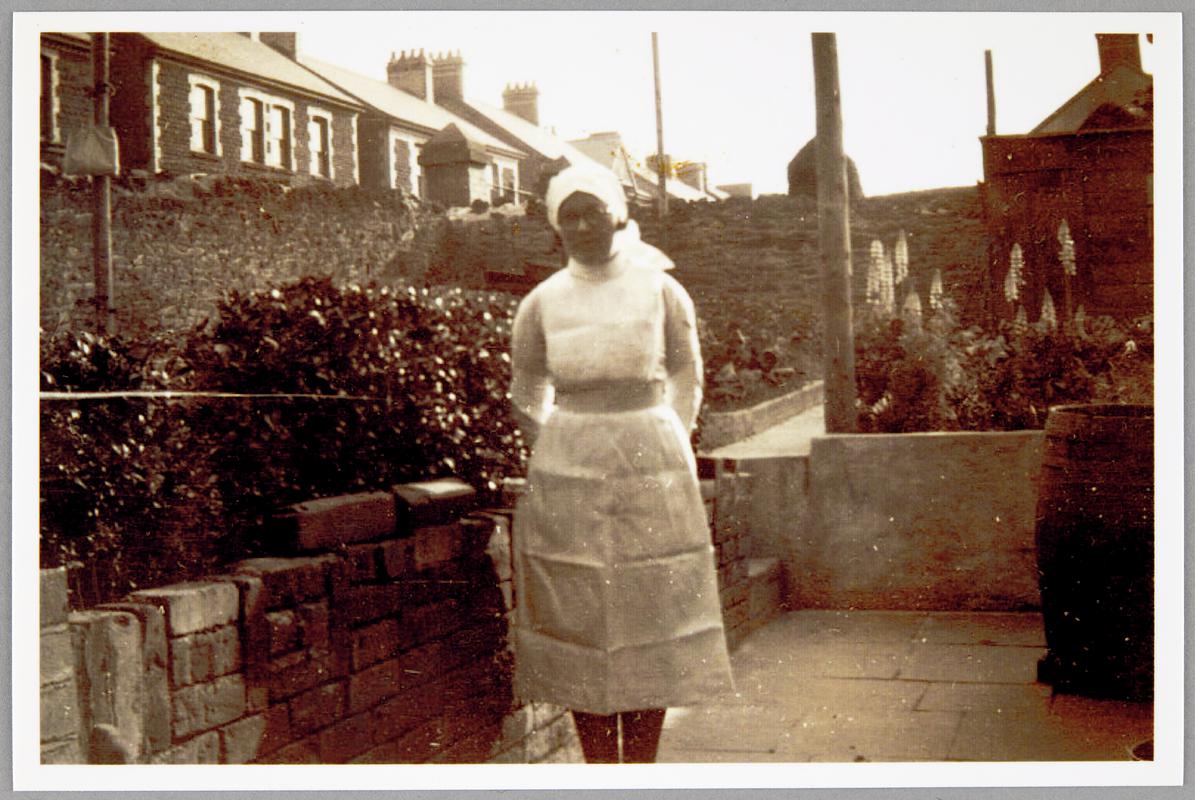 Mrs Gertrude Morgan (nee Davies) in nursing uniform, c. 1930s. Trained in London, Mrs Morgan later became a midwife at Morriston Hospital. Her midwife&#039;s uniform and certificates in collection (F2013.14)