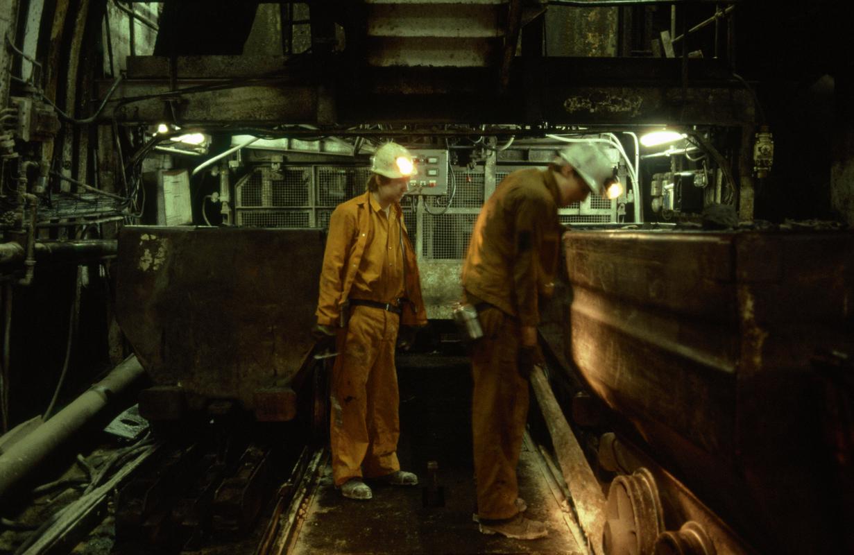 Colour film slide showing miners and drams at pit bottom, Oakdale Colliery 21 May 1981.