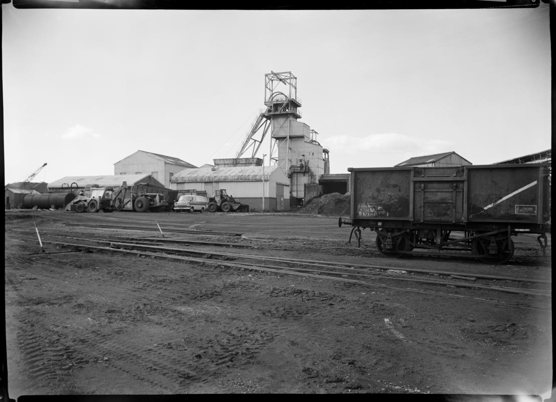 Black and white film negative showing a surface view of Brynlliw Colliery and yard. &#039;Brynlliw Glam 1973&#039; is transcribed from original negative bag.